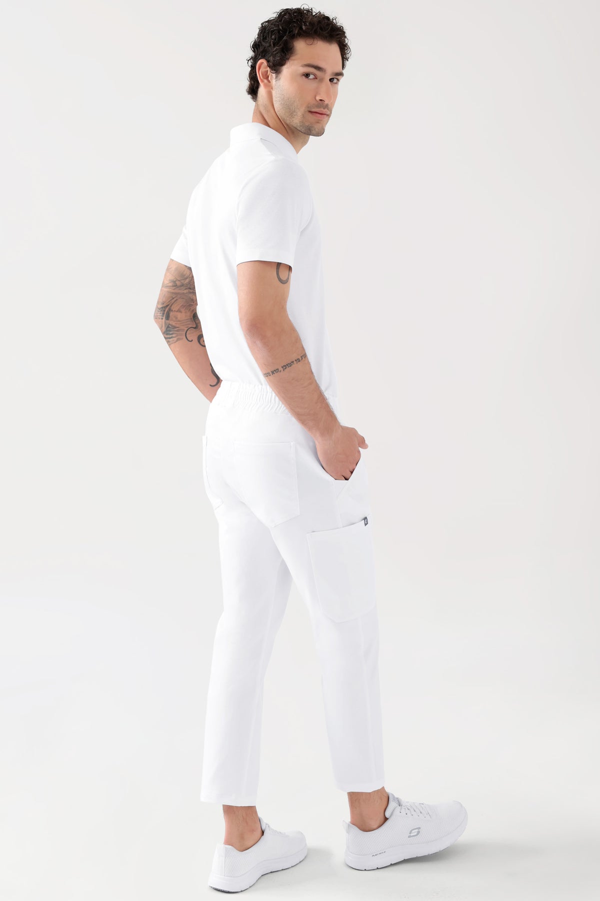COMFY FLEX Stretch broek Unisex - 7/8 Lengte wit, Achterzijde view Het model is 188 cm lang en draagt maat M