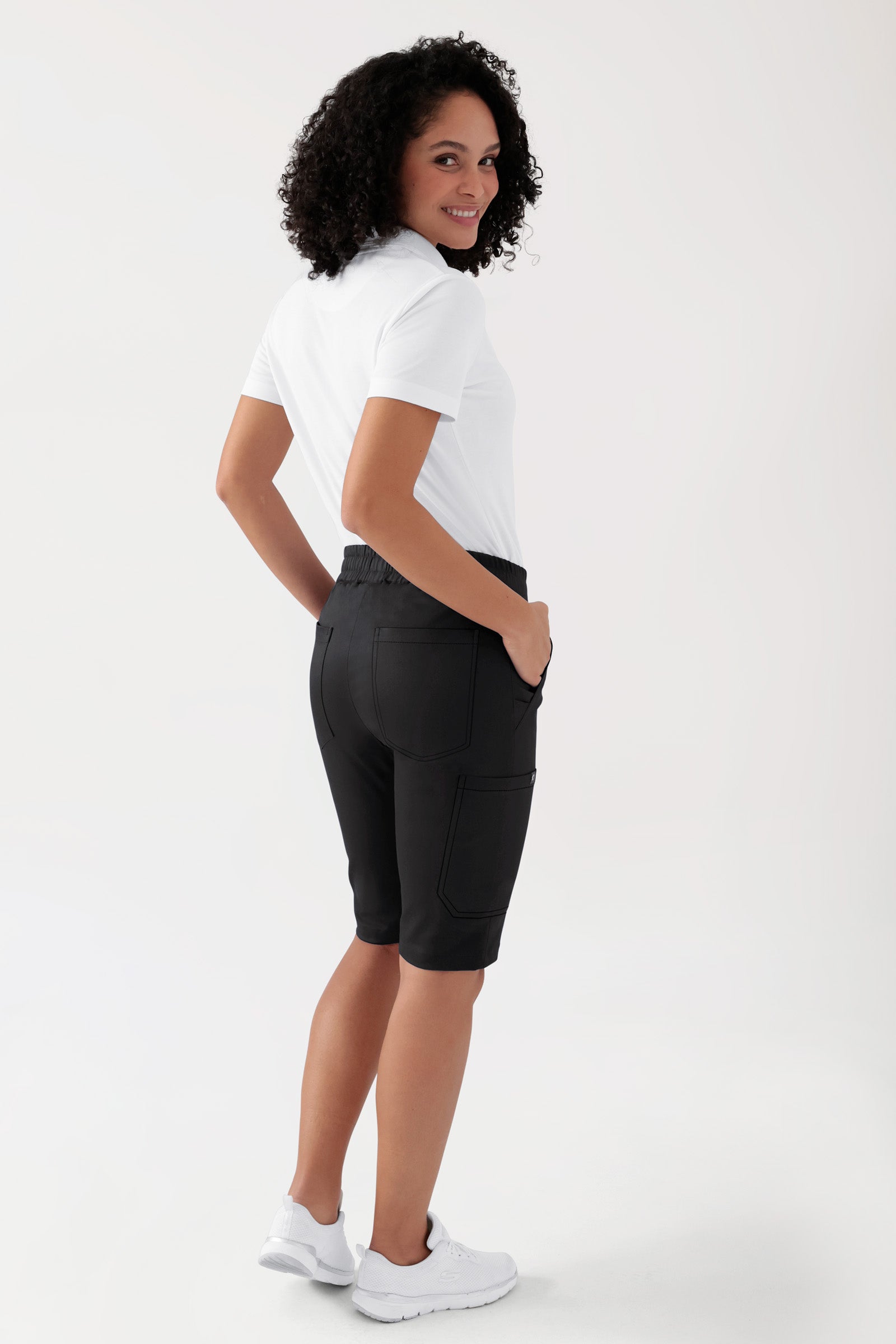 COMFY FLEX Stretch broek Unisex - bermuda zwart, Achterzijde view Het model is 176 cm lang en draagt maat S