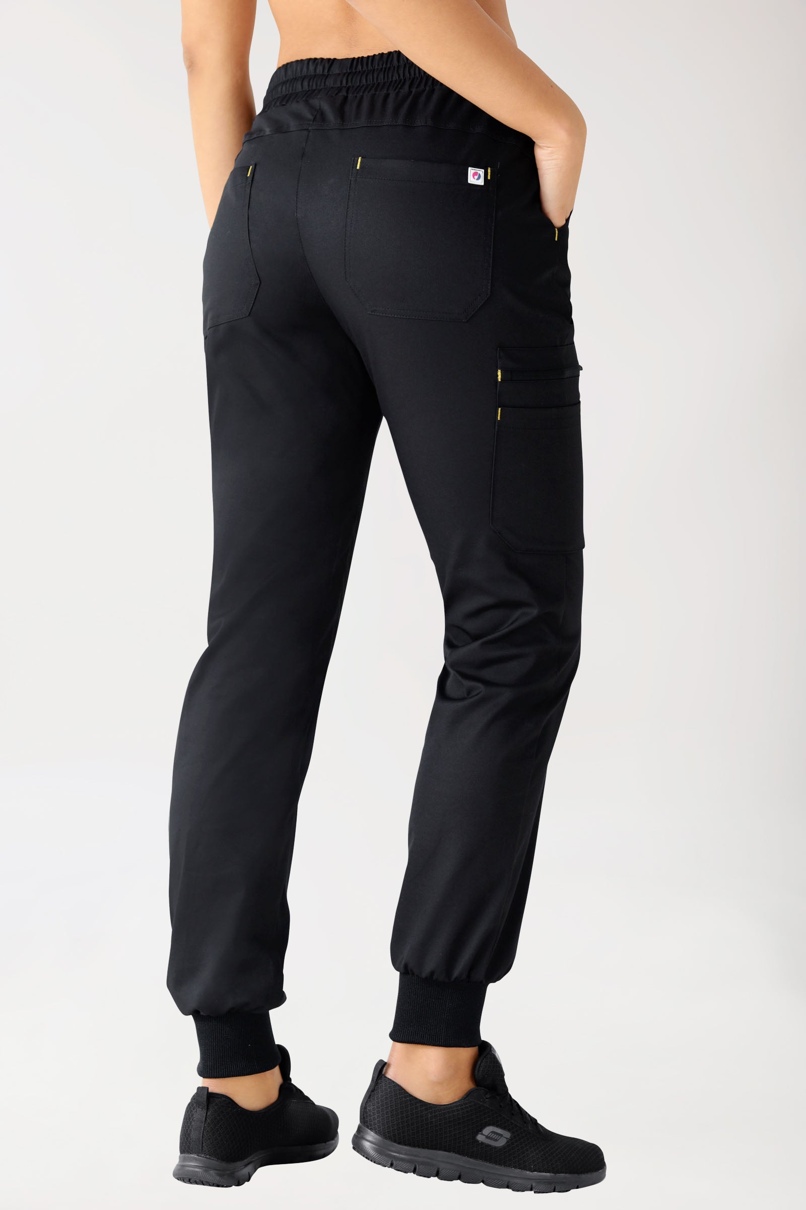 CLINIC STRETCH broek dames - gebreide tailleboord zwart/geel