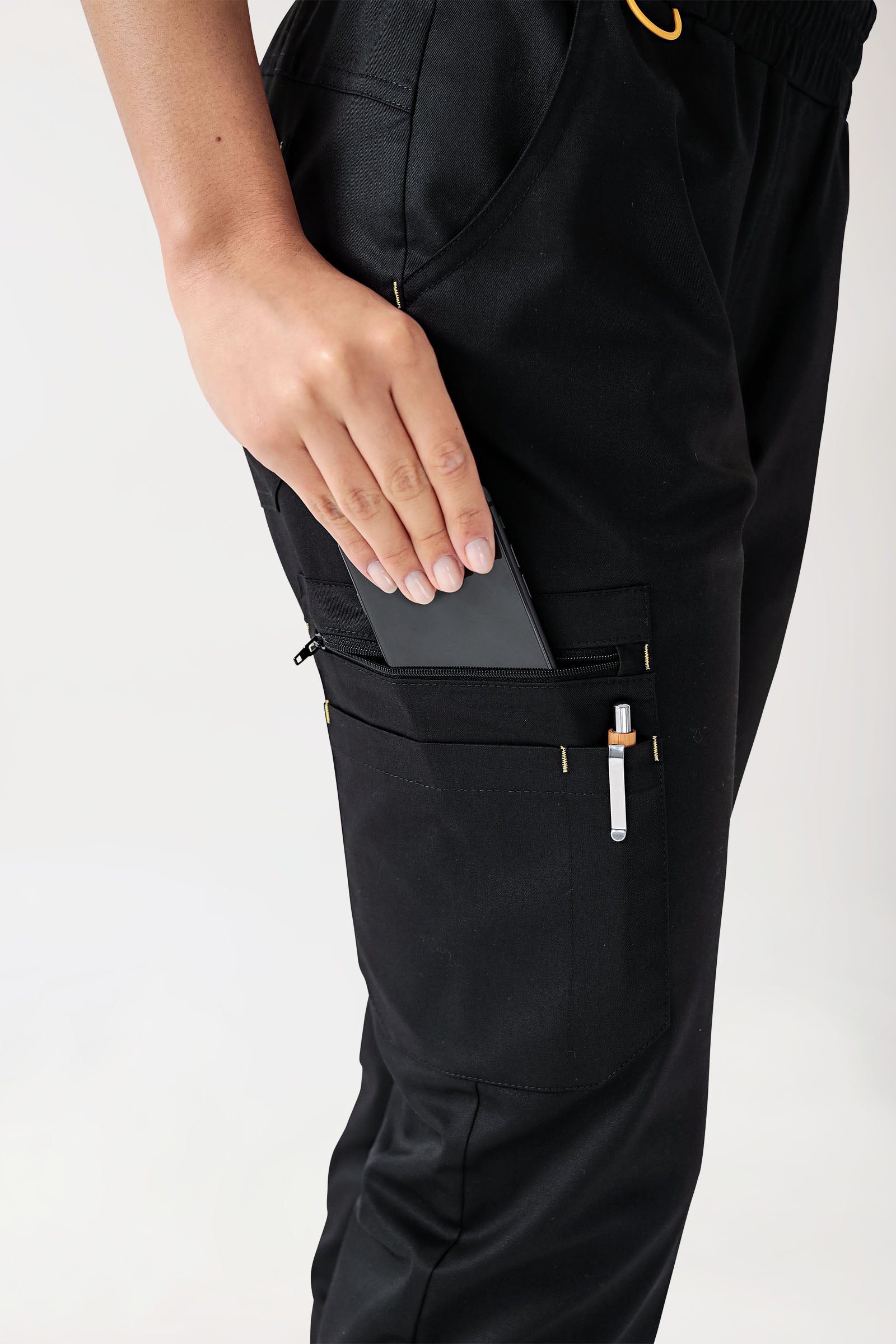 CLINIC STRETCH broek dames - zwart/geel