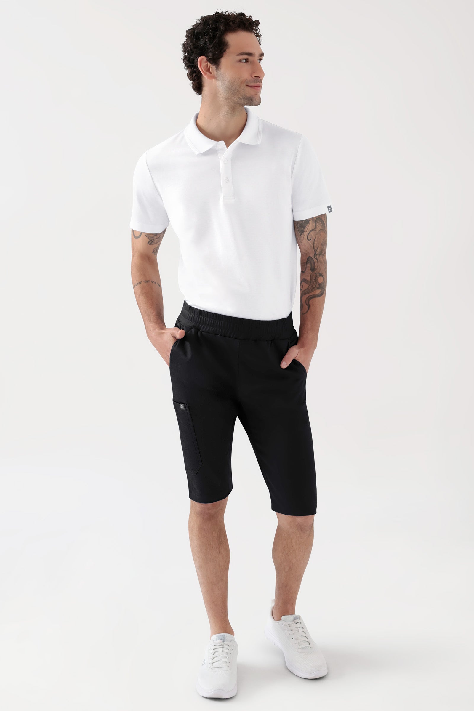 COMFY FLEX Stretch broek Unisex - bermuda zwart, Voorzijde view Het model is 188 cm lang en draagt maat M