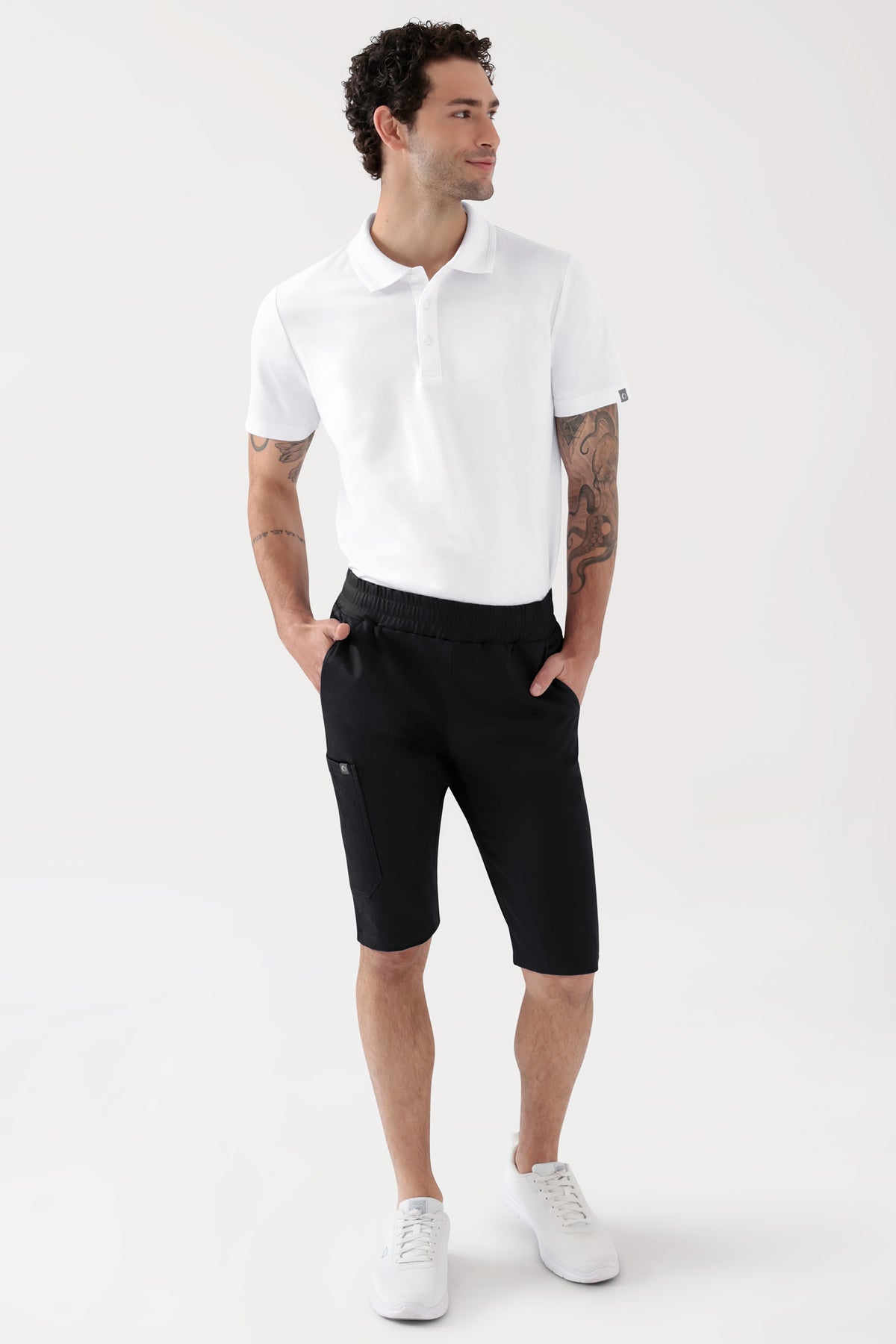 COMFY FLEX Stretch broek Unisex - bermuda zwart, Voorzijde view Het model is 188 cm lang en draagt maat M
