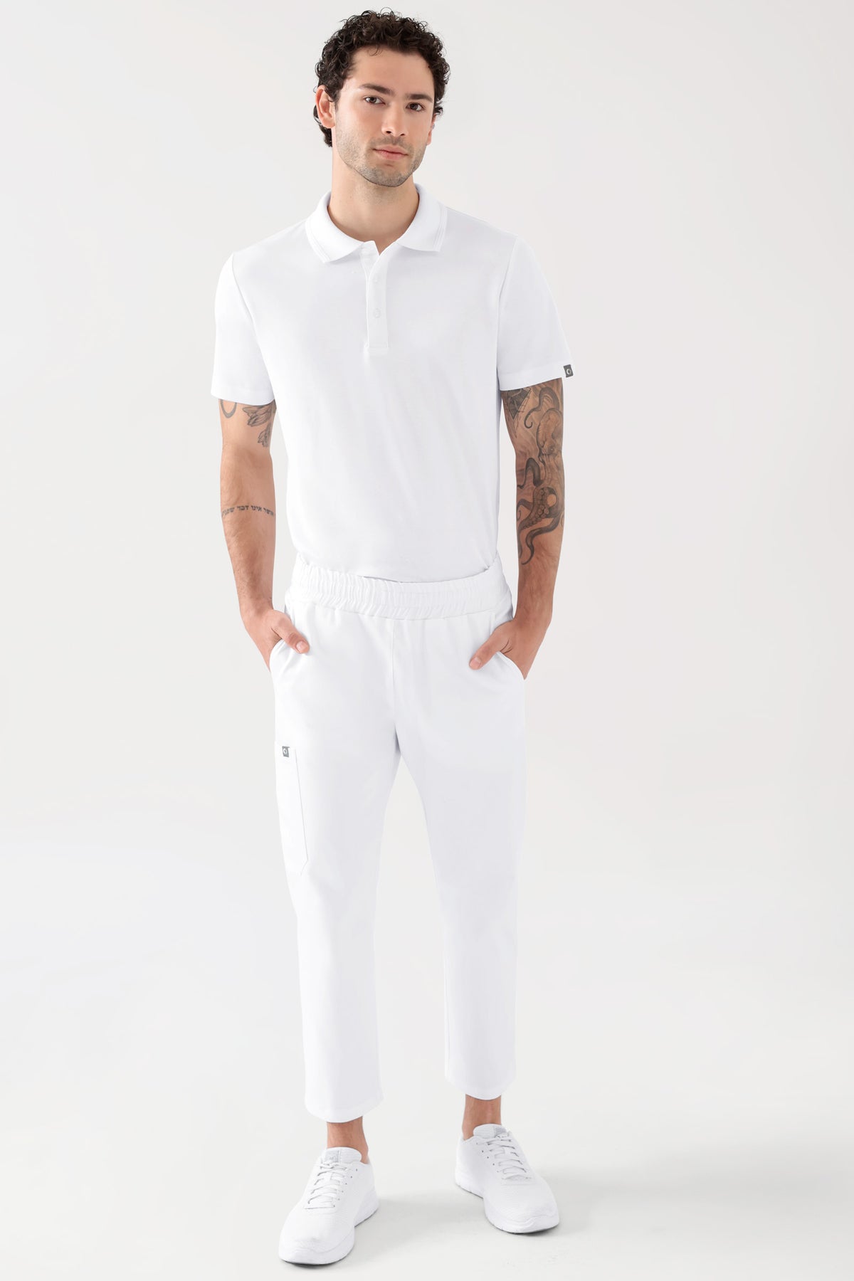 COMFY FLEX Stretch broek Unisex - 7/8 Lengte wit, Voorzijde view Het model is 188 cm lang en draagt maat M