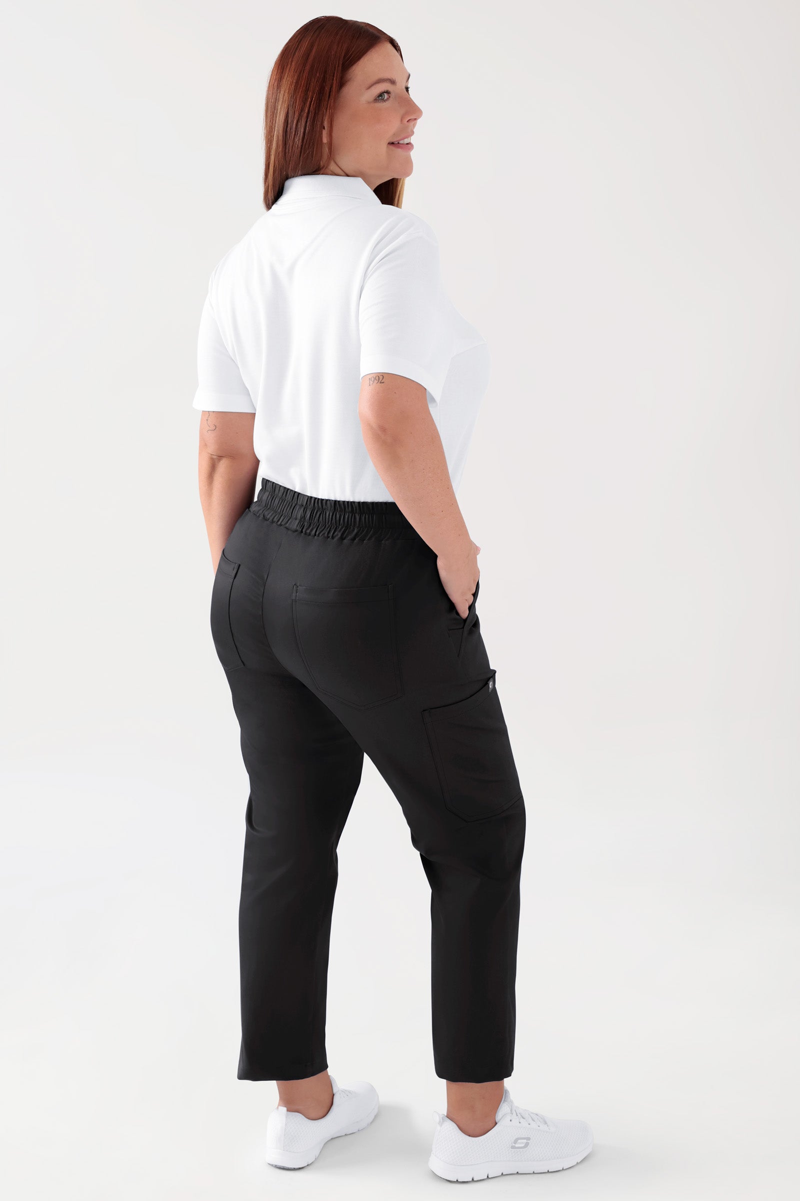COMFY FLEX Stretch broek Unisex - 7/8 Lengte zwart, Achterzijde view Het model is 173 cm lang en draagt maat L