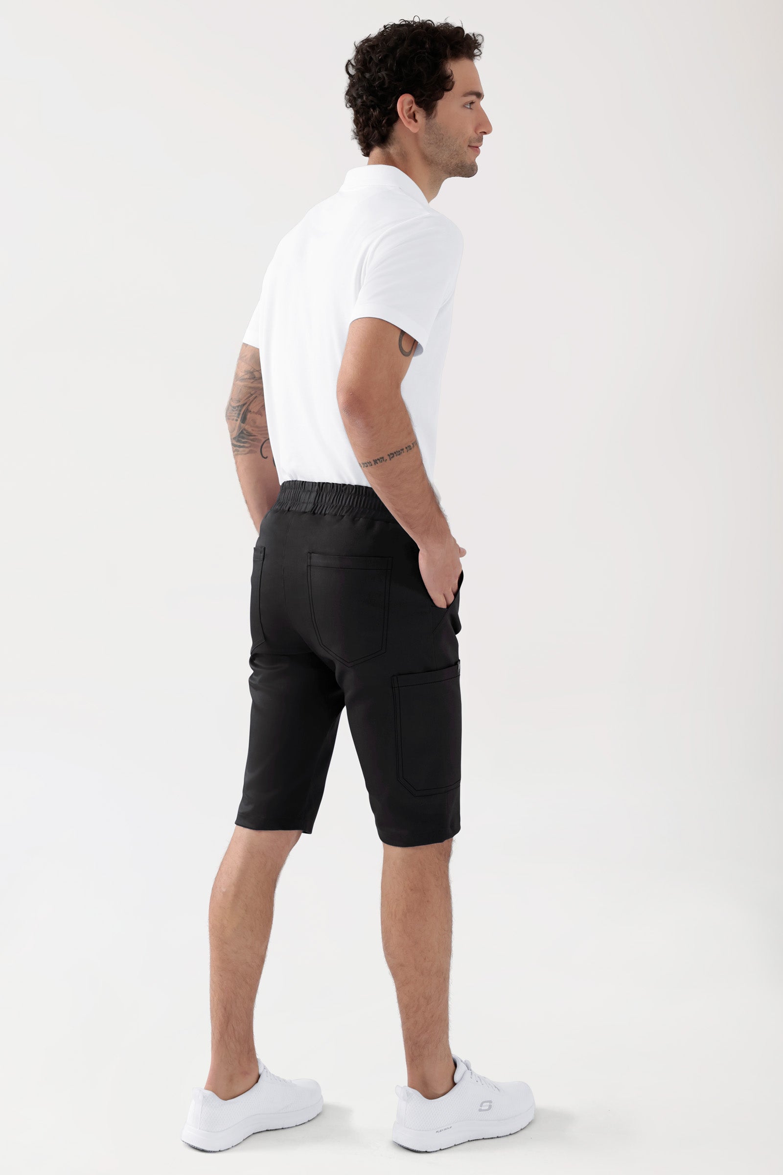 COMFY FLEX Stretch broek Unisex - bermuda zwart, Achterzijde view Het model is 188 cm lang en draagt maat M