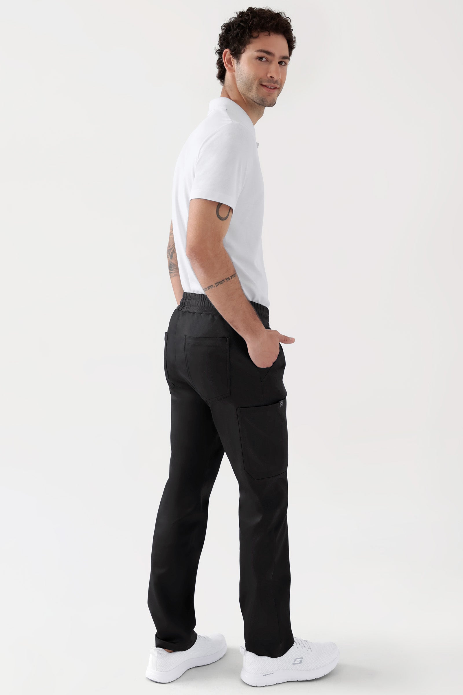 COMFY FLEX Stretch broek Unisex - 1/1 Lengte zwart, Achterzijde view Het model is 188 cm lang en draagt maat M