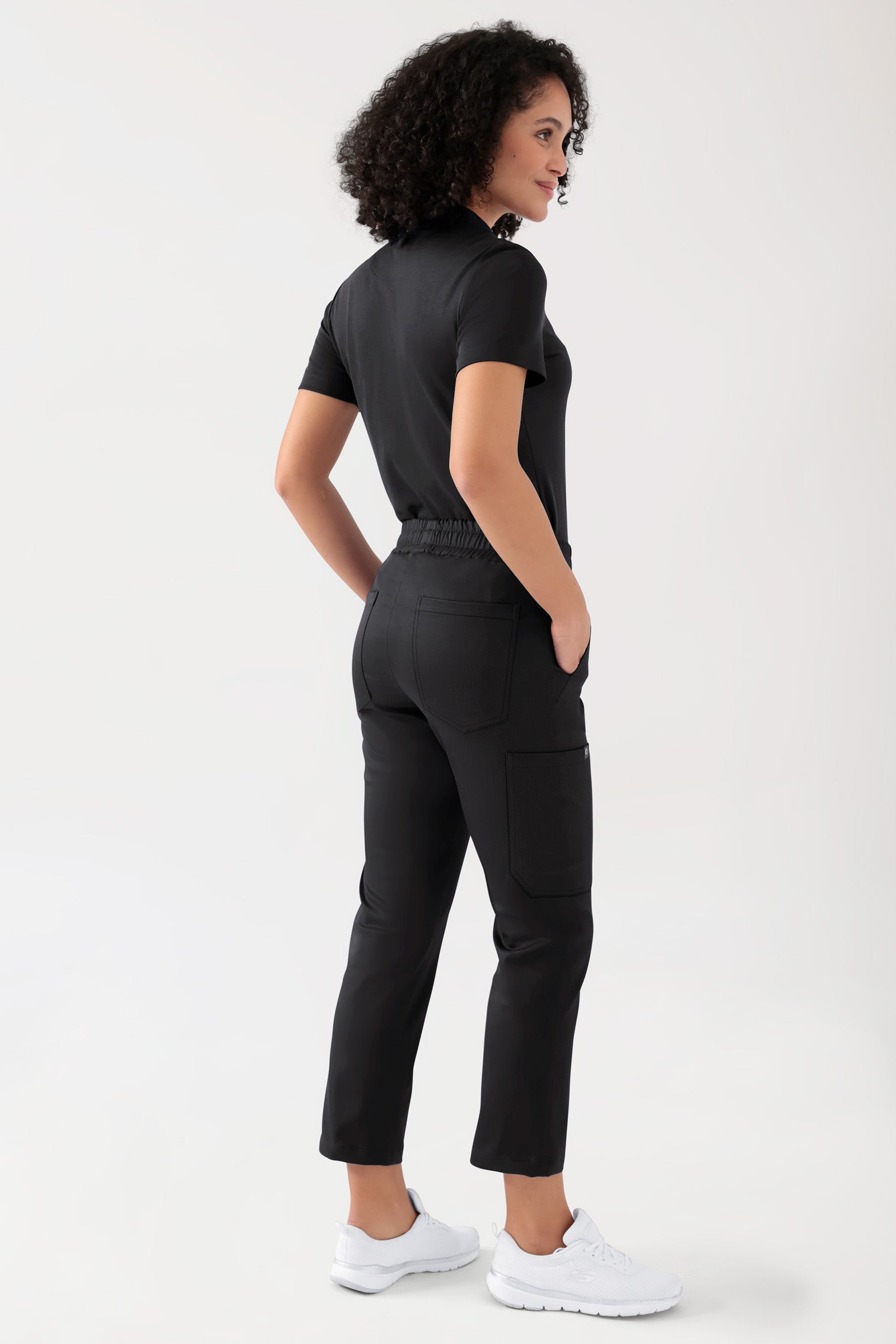 COMFY FLEX Stretch broek Unisex - 7/8 Lengte zwart, Achterzijde view Het model is 176 cm lang en draagt maat S