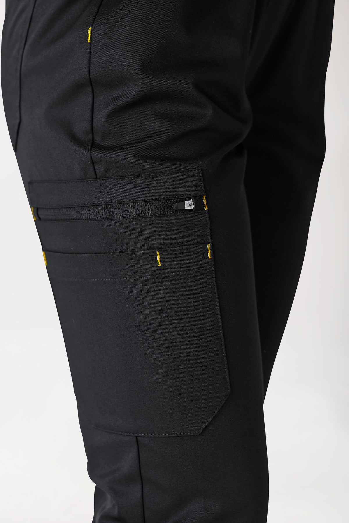 CLINIC STRETCH broek dames - gebreide tailleboord zwart/geel